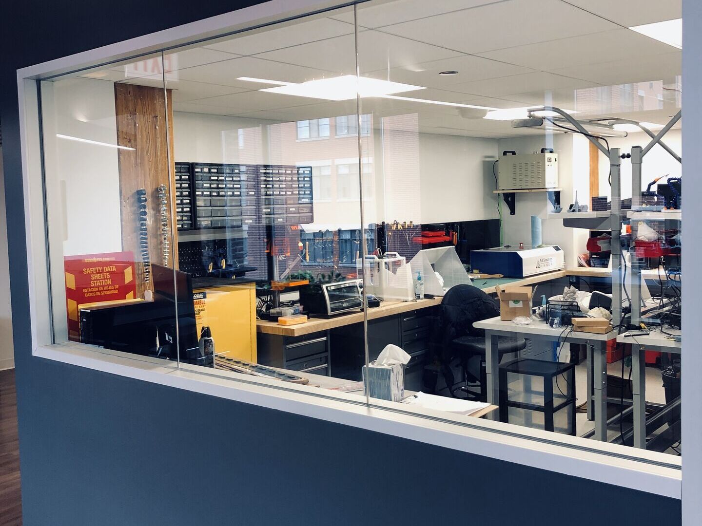 Rocket Wagon hardware lab seen through a glass wall
